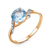 Кольцо из золоченого серебра с голубым топазом и фианитами
